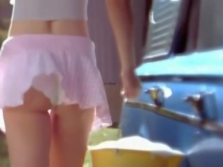 Sexy babe washing bil