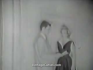 Survey man picks up a jatty (1950s wintaž)