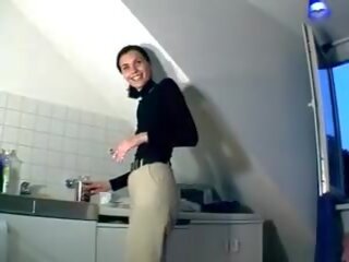 A stunning-looking german adolescent making her cunt udan with a dildo